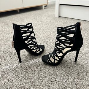 Jessica Simpson black heels. Never been worn. Size 5